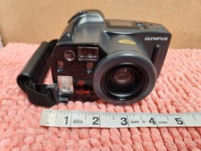 Olympus Infinity Super Zoom 300 35mm SLR Film Camera w/ Film Inside ESTATE