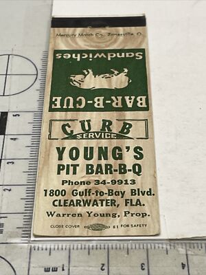 Front Strike Matchbook Cover  Young s Pit Bar-B-Q  Clearwater, FL  gmg  Unstruck