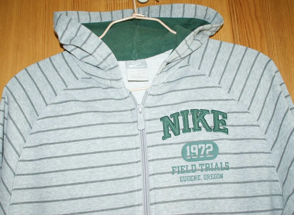 VESTE SURVETEMENT A CAPUCHE Marque NIKE taille 12 13 ans Gris rayé manches longu - Photo 2/4