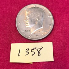 Medio dólar Kennedy 1971-D 50C CON LETRAS FG debajo del muslo izquierdo del águila