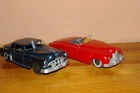 Lot of 2 plastic wind up cars. Saunders Cadillac convertable & Marx Pontiac.