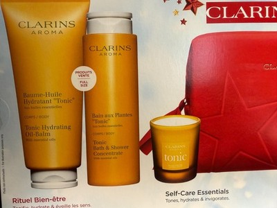 CLARINS Aroma 4-PC set (Tonic Oil Balm, Bath & Shower Concentrate, Candle, Bag)