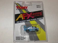 Tomy/AFX ' #26 FOX RACING UNLIMITED F-1 INDY' Sealed on card