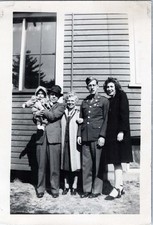 WW2 Photo Of Soldier With 4 Civilians Posed By House Window
