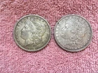 MORGAN SILVER DOLLAR COINS.  LOT OF 2 CIRCULATED   PRE. 1921 LOT # 1