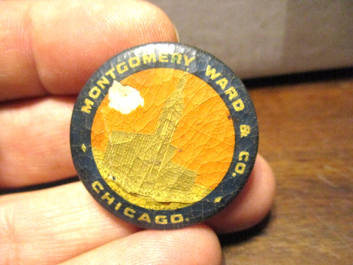 Montgomery Ward & Co. in Chicago early 1900's celluloid w metal back 1.25 diam