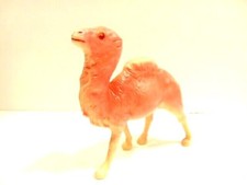 vintage pink celluloid camel with crystal eyes