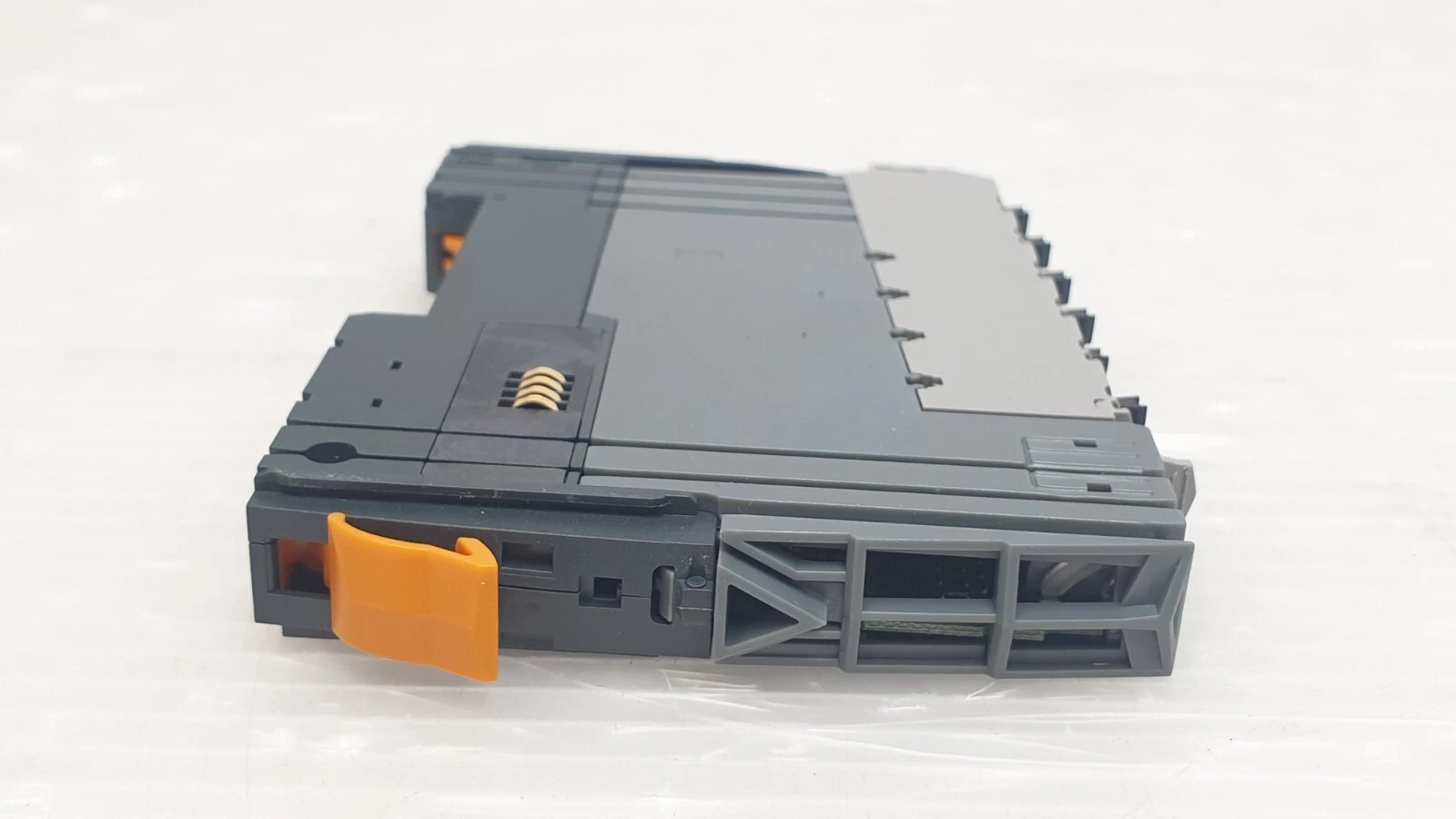 End view of the X20BM11 bus module with orange release lever