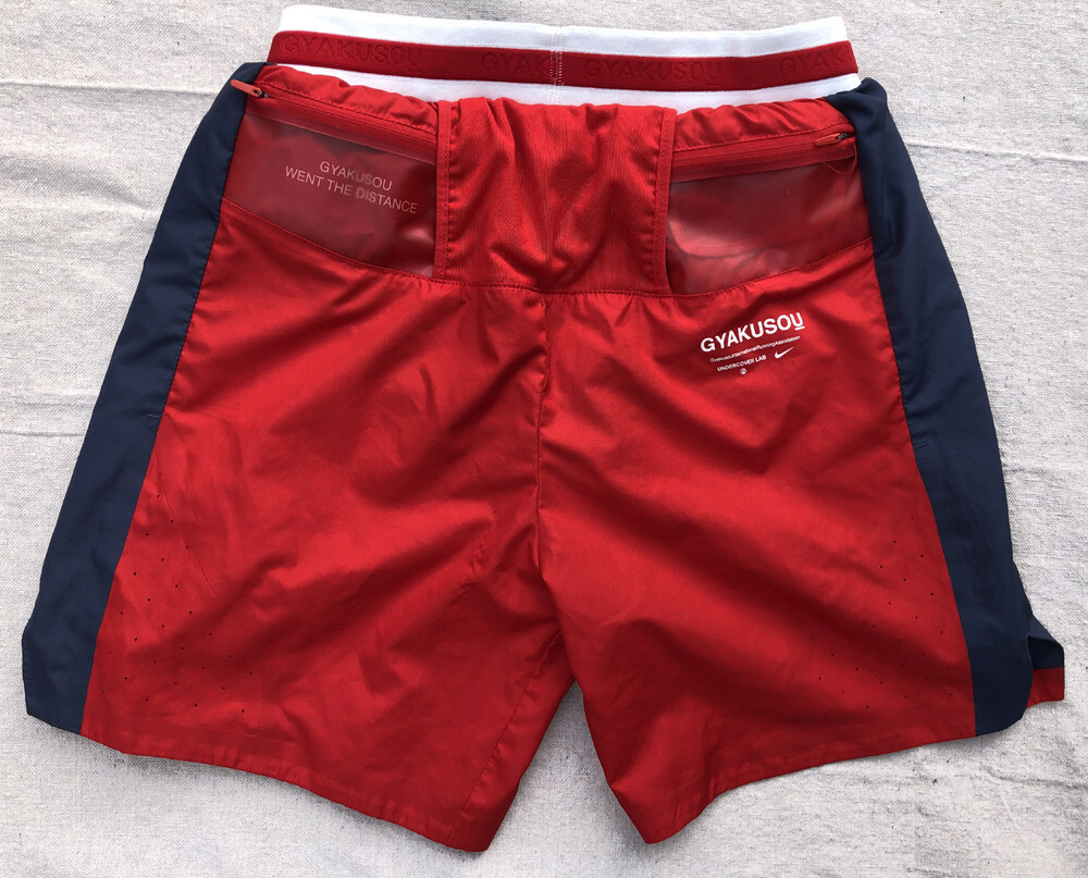 Nike GYAKUSOU レッドショートパンツ nike men nrg na utility shorts sport red thunder blue sail