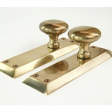 Aged Unlacquered Solid Brass Newport Round Door Knobs Handles on Long Backplate