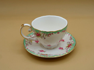 Gracie China by Coastline Imports Teacup and Saucer Set Rose W/Gold Trim