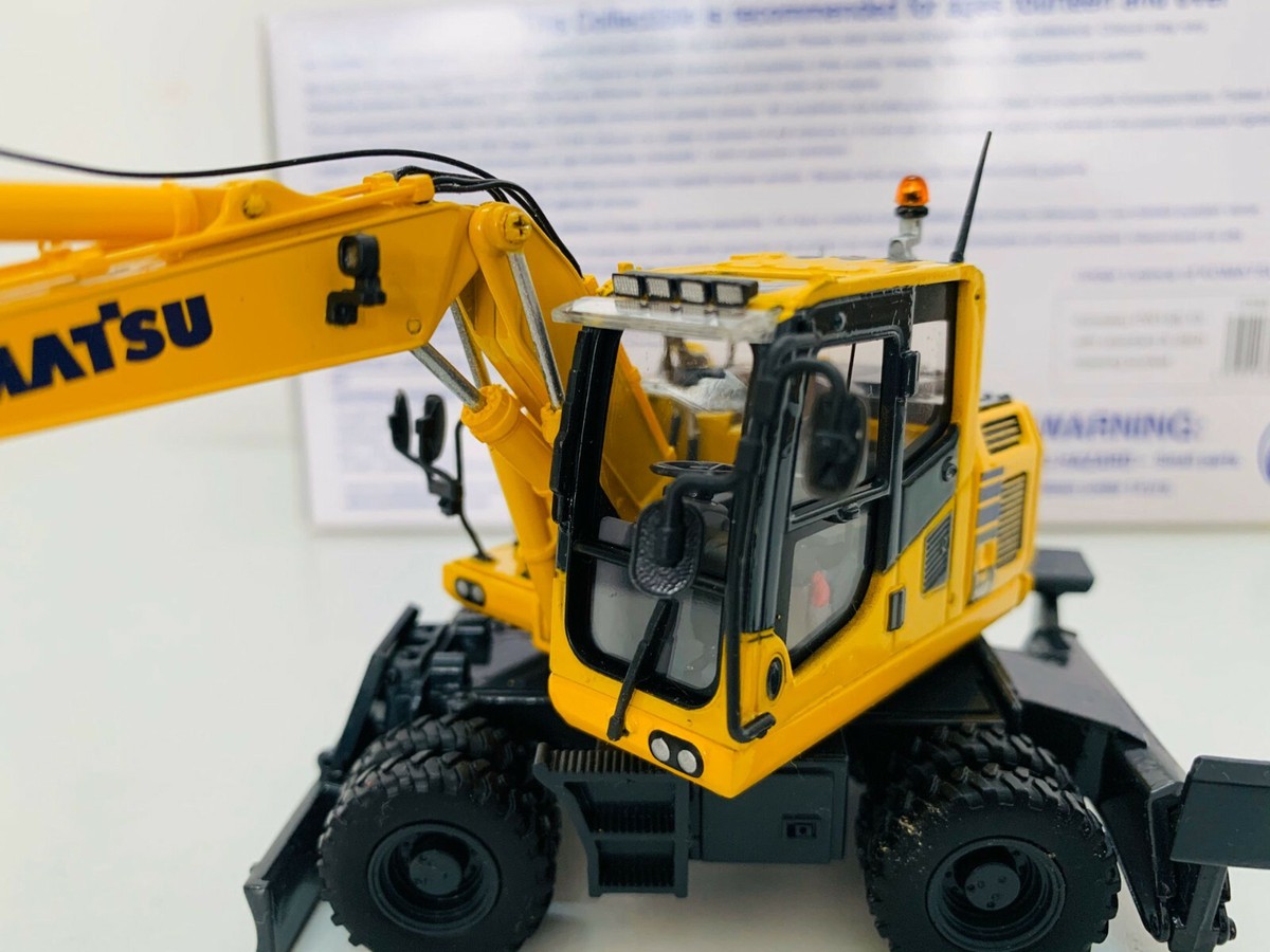 Komatsu PW148-10 With Standard Ditch Cleaning Bucket Wheel Komatsu PW148-10 With Standard Ditch Cleaning Bucket Wheel