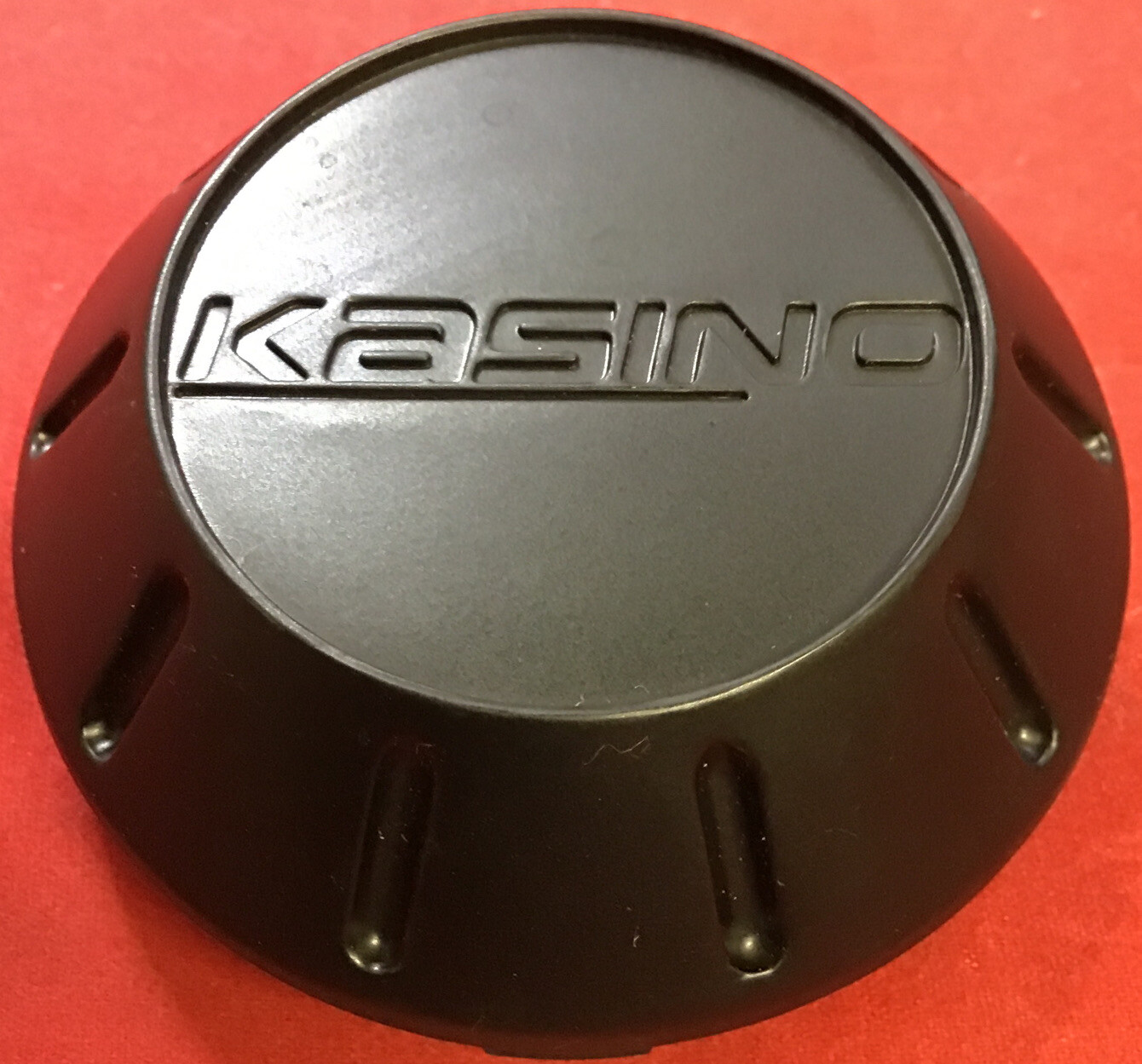 ONE NEW FLAT BLACK KASINO CENTERCAP PD-CAP71-P1035/LG1010-66 11578