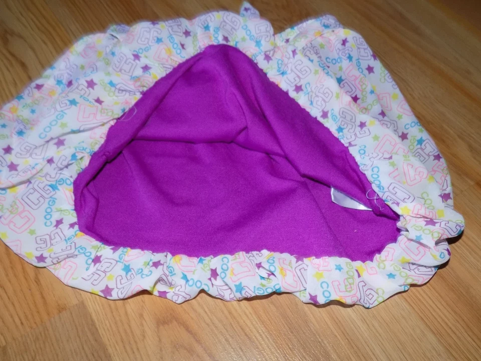 Minifalda COOGI con dobladillo de burbujas blanca magenta rosa estampado CG para niñas talla 6 usada en excelente estado Foto 3 de 4