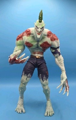 McFarlane DC Multiverse Joker Titan Glow in the Dark Gold Label Exclusive