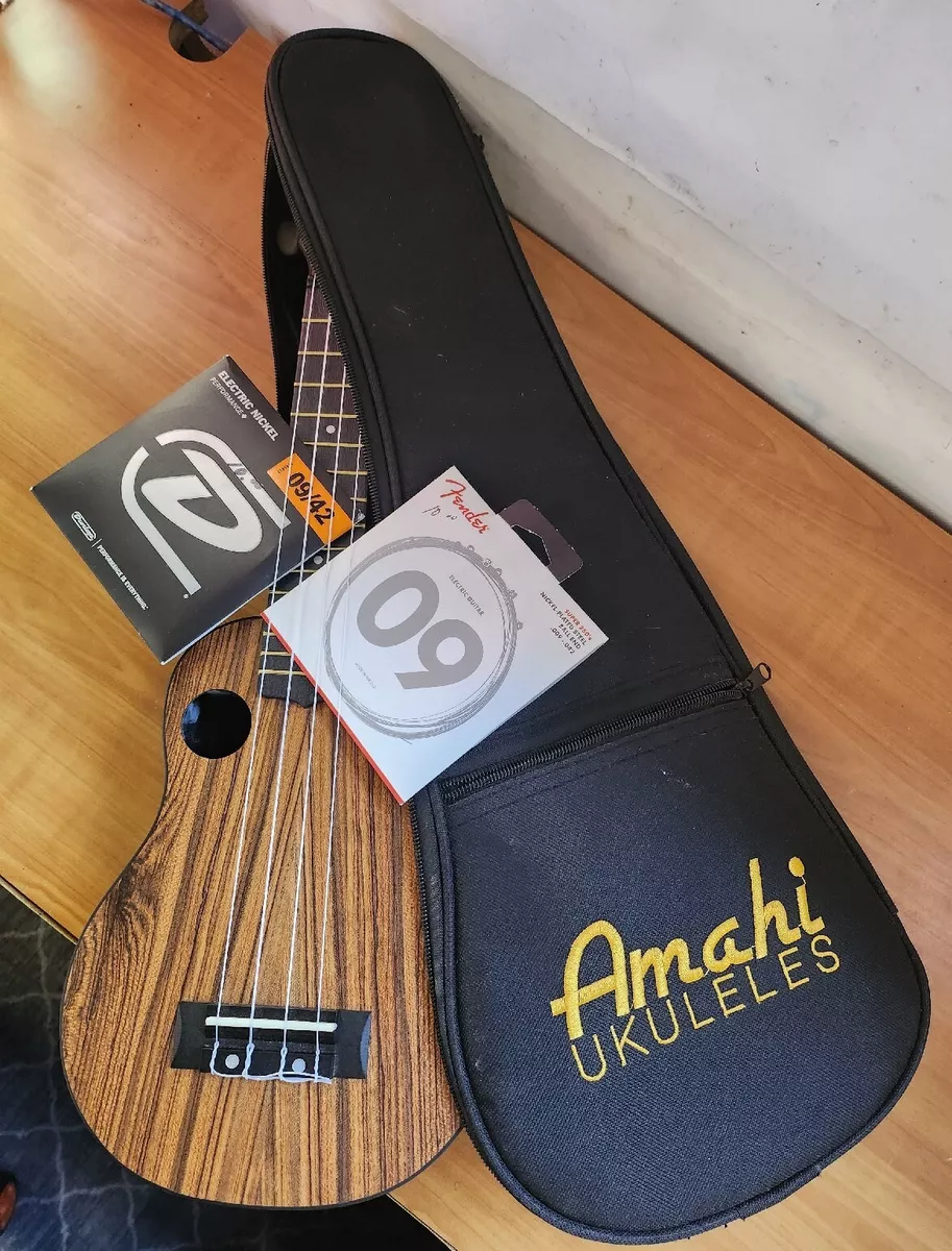 Amahi Ukulele ABS Plastic back sides and neck Mahagony Top Extra Strings