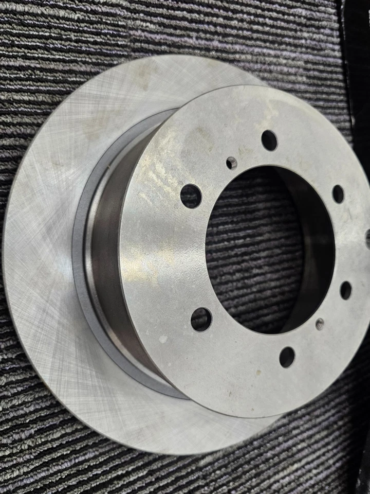 (CANTIDAD 2) Rotor de freno trasero con orificio de 6 pernos 97-04 Mitsubishi Montero Sport YH141777 Foto 2 de 4