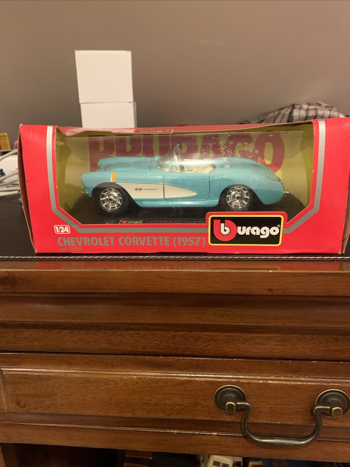 BURAGO 1/24 -  1957 CHEVROLET CORVETTE IN LIGHT BLUE - Unused Box Wear