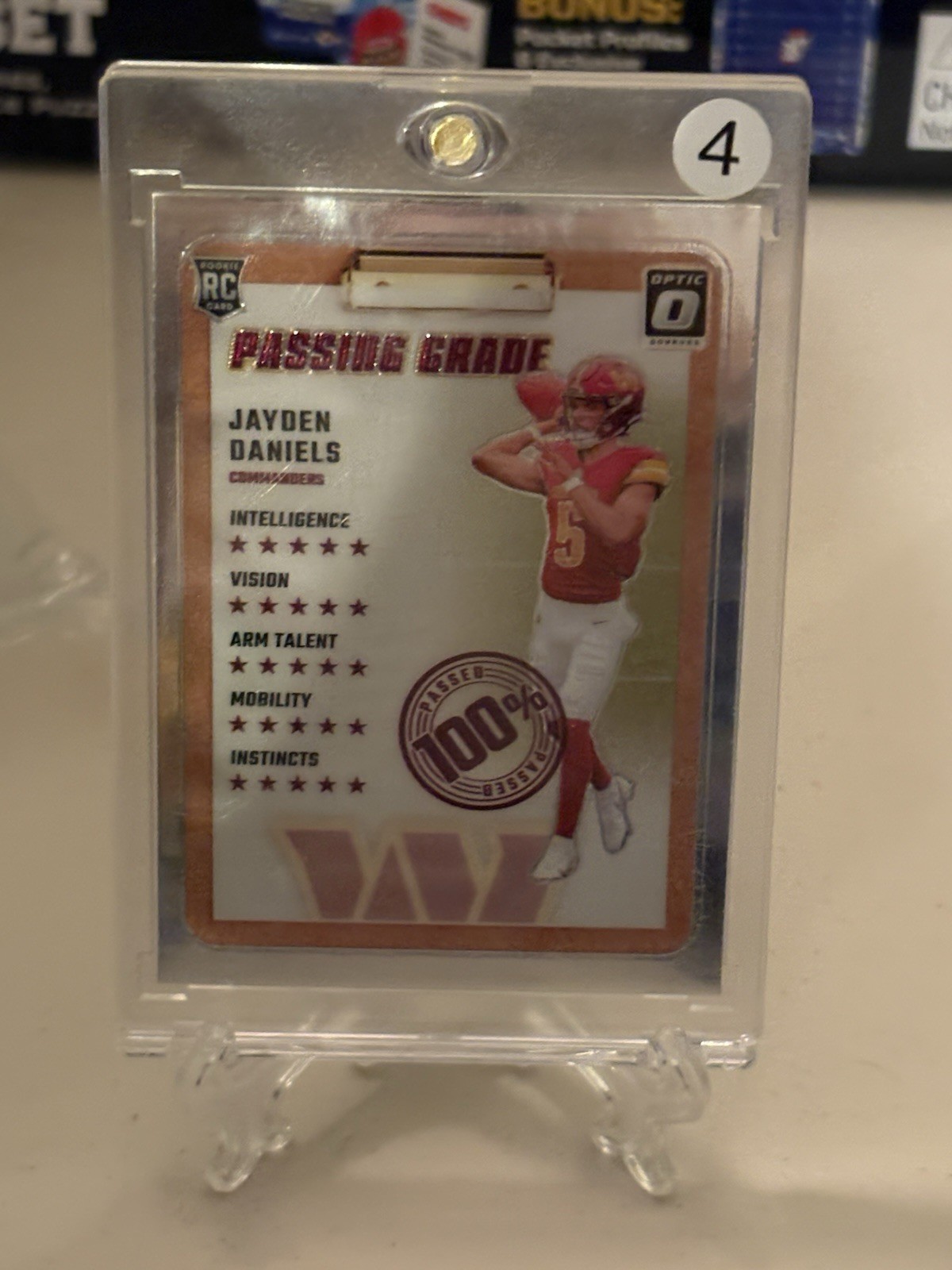 2024 Donruss Optic #2 Jayden Daniels Passing Grade RC Washington Commanders