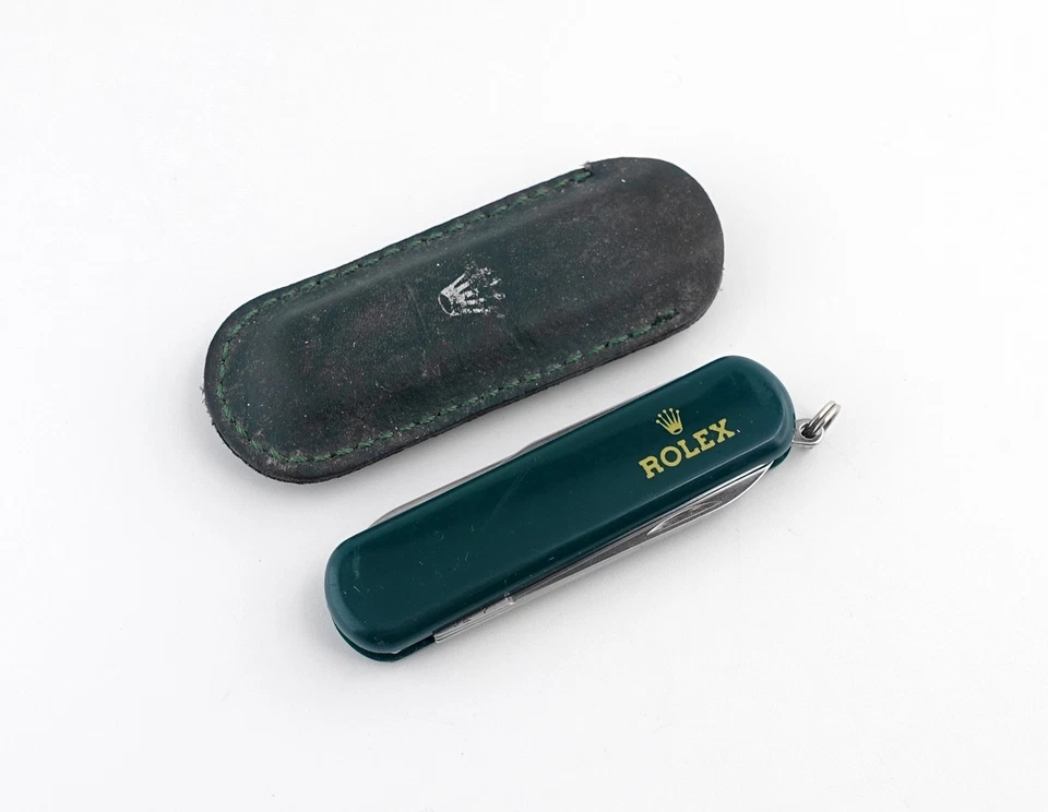 Navaja de bolsillo Rolex / multiherramienta con soporte de cuero firmado (artículo #439) Foto 2 de 4