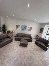 Next Grey Leather 4-Seater Sofa, plus storage footstall and 2 snuggle chairs