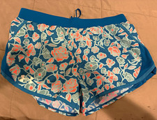 Girls Large under Armour shorts L Blue Floral Athletic Shorts