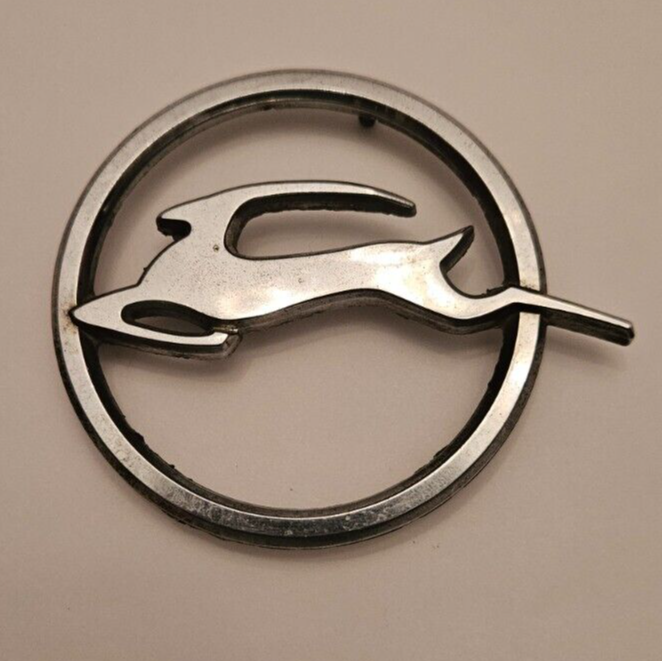 1960-1964 Chevrolet Impala Rear Quarter Panel Emblem - P/N - 4877314 - With Pins