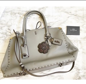 coach cooper carryall with rivets