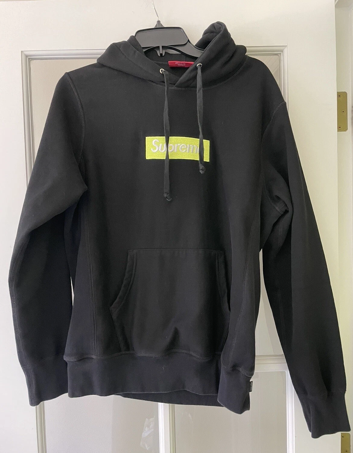 veste sweat à capuche suprême femme taille moyenne