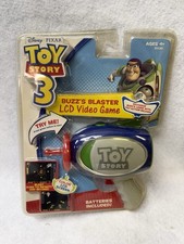 Toy Story - Buzz s Blaster LCD Handheld Game ...