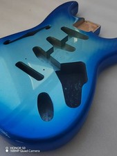 Custom electric guitar, semi-hollow, F-hole, body blue.
