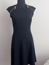 Michael Kors LBD. Size 4 Black A Line Bottom Dress Flatter Fitting On Top