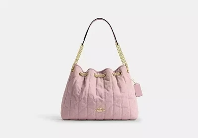 sac à bandoulière coach Evelyn - denim matelassé et breloque rose Loved... - Photo 1/4