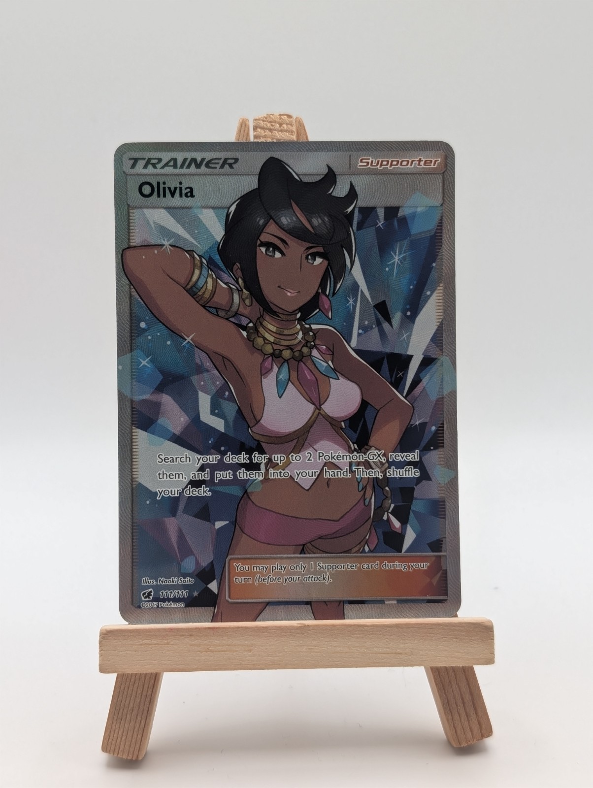 Olivia 111/111 - Crimson Invasion Pokemon Card - NM