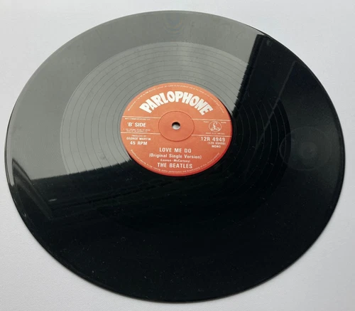 THE BEATLES "LOVE ME DO" 1982 RARE 12" PRE RELEASE PRESS IN BLACK DIE CUT SLEEVE