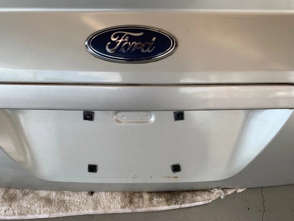 Ford Fivortent Mercury Montego 2005 2006 2007 tapa maletero plata escarcha metálica Foto 3 de 4