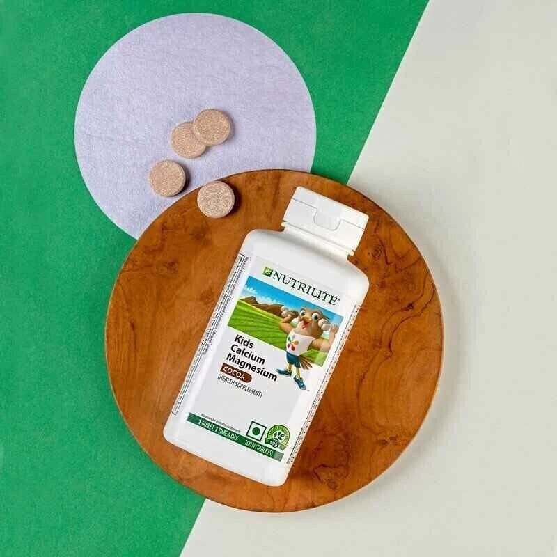Amway Nutrilite Kids 100 comprimidos calcio magnesio cacao para huesos y dientes sanos Foto 3 de 4