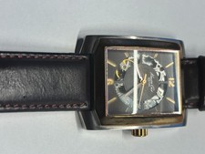 The Kenneth Cole New York Men's Watch KC1454 is a rectangular automatic skeleton