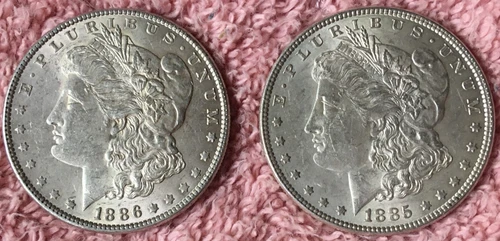 MORGAN SILVER DOLLAR COINS.  LOT OF 2 UNCIRCULATED  PRE. 1921 LOT # 23