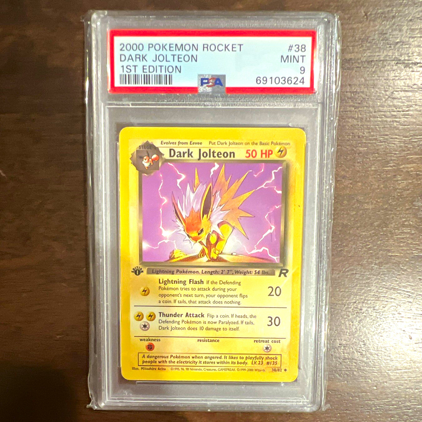 Pokémon Company 2000 Team Rocket Dark Jolteon 38/82 1st Ed PSA 9 EN