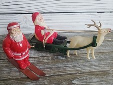 2 Vintage Celluloid Santa s 1-Metal Skis 1-Sleigh w/Deer 1940's Christmas ORN