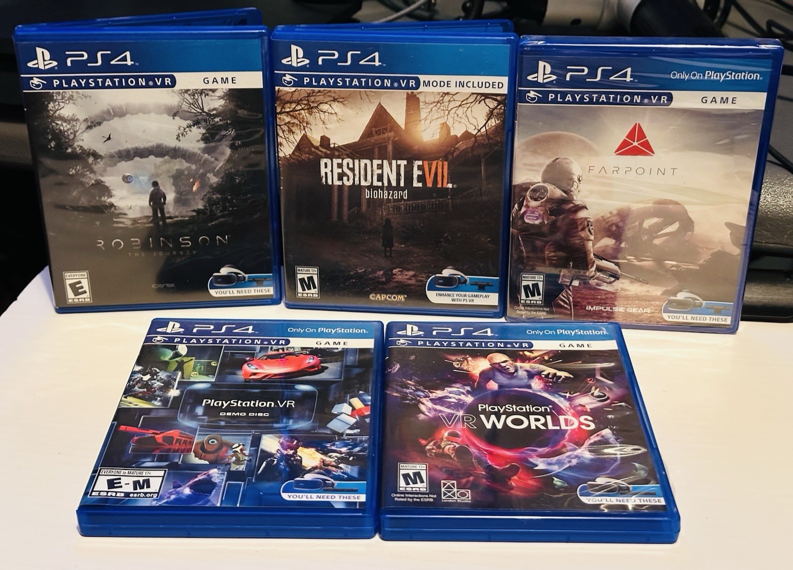 PlayStation 4 VR Game Bundle (5) Resident Evil, Robinson, Farpoint, VR Worlds