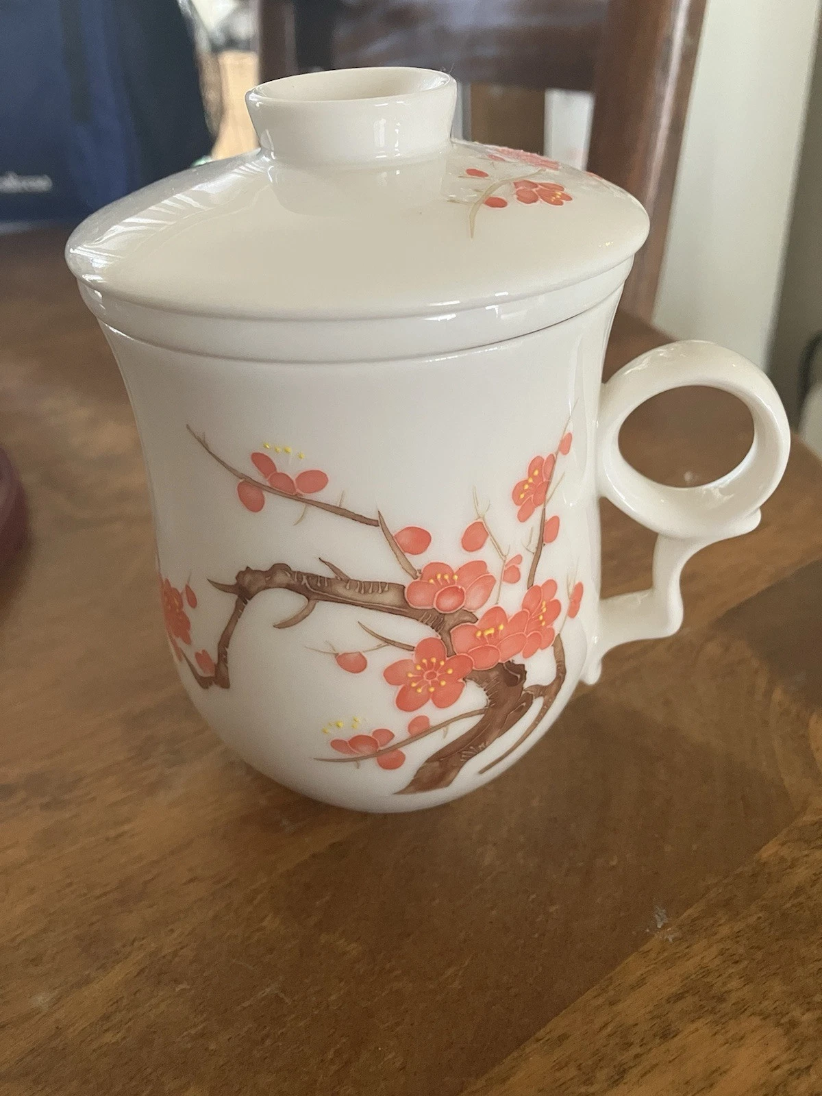 Teavana Porcelain cherry blossom three-piece 8oz Tea cup,infuser, and Lid