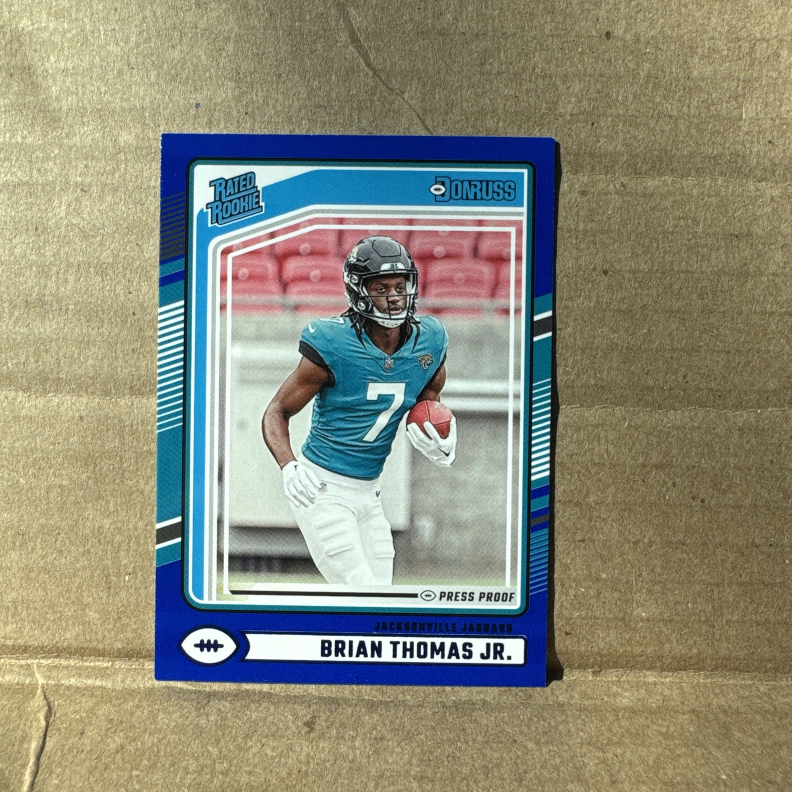 2024 Donruss Rated Rookie Brian Thomas Jr. #313 Blue Press Proof Jaguars RC