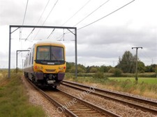 Photo 6x4 Train leaving Littleport Sandhill/TL5786 Class 365 electric un c2009