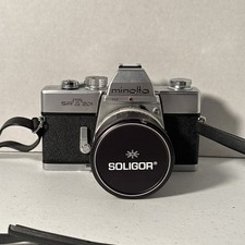 Minolta SRT 201 35mm Camera W/ 28mm Soligor Lens