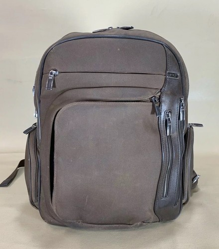 tumi backpack used