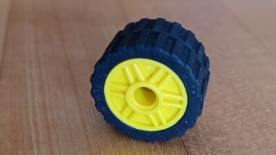 Lego Yellow Wheel #55981 with Black Tire #89201 - part #55981c06