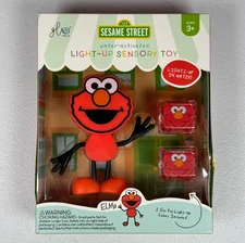 Glo Pals Light-Up Cube with Elmo – Sesame Street Liquid-Activated Character Toy