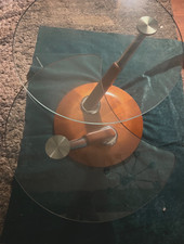 a swirl wood and glass coffee table